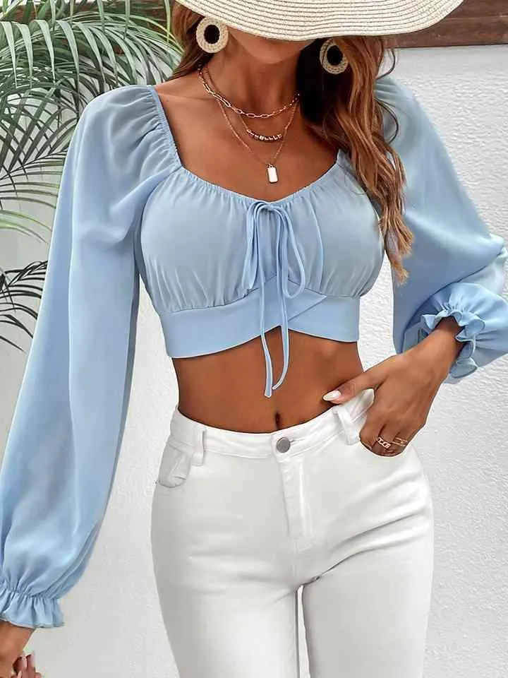 Flirty And Trendy Tie Back Balloon Sleeve Crop Top