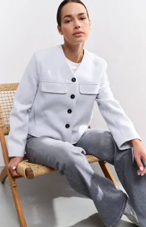 Soft short jacket with chest pockets and button closure
